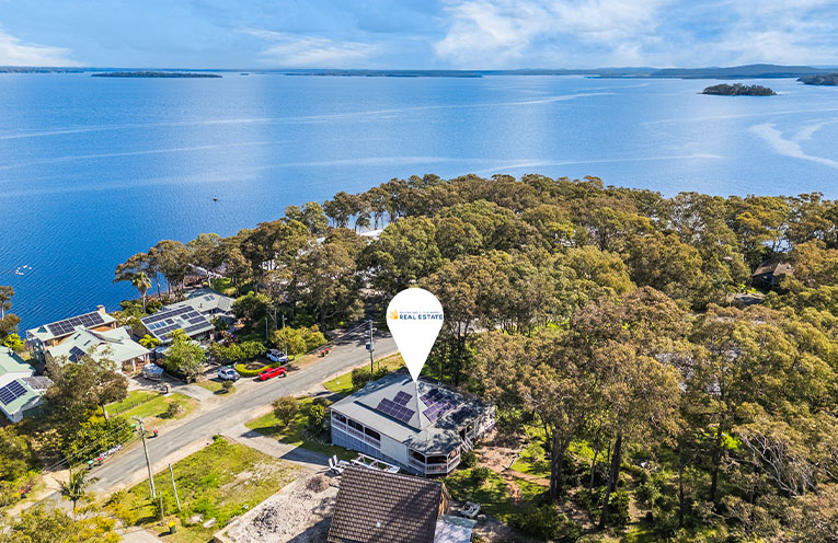 1 The Esplanade, North Arm Cove is on the market with Tilligerry/Nelson Bay Real Estate