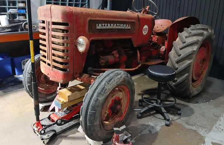 Under Rotarian mentorship, local students refurbish an International tractor
