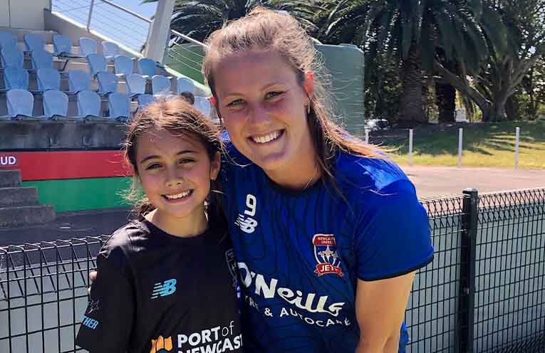 Malia, 10, meets soccer idols at Jets holiday skills clinic