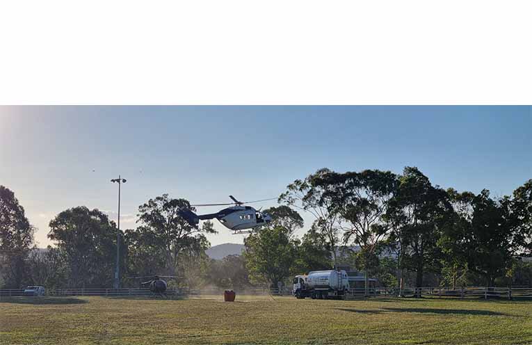 Recon and water-bombing aircraft land, refuel and take off from Bulahdelah Showground,Photo: Thomas O’Keefe.