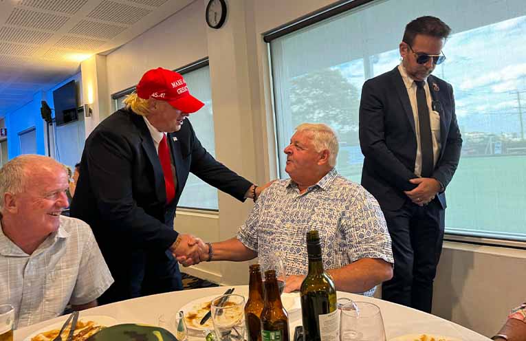 Hamish Salburg met guests as Donald Trump, complete with Secret Service detail.