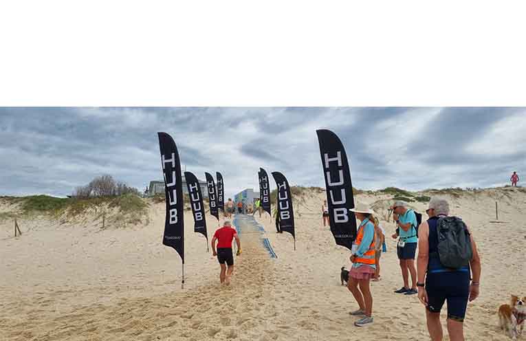 The Bennetts Beach MobiMats made life a little easier for racers after their initial swim. Photo: Thomas O’Keefe.