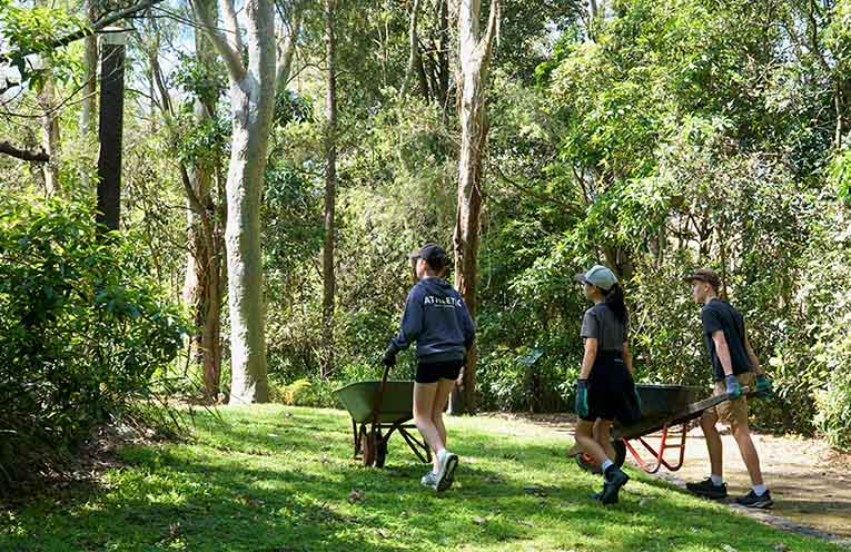 Trinity Catholic College Students working on the Sensory Trail.