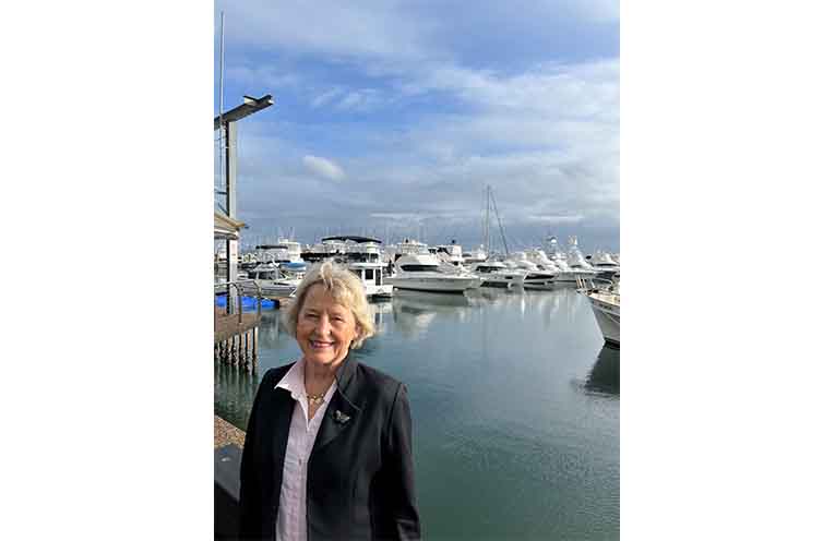 Helen Dugdale by the bay. Photo: supplied.