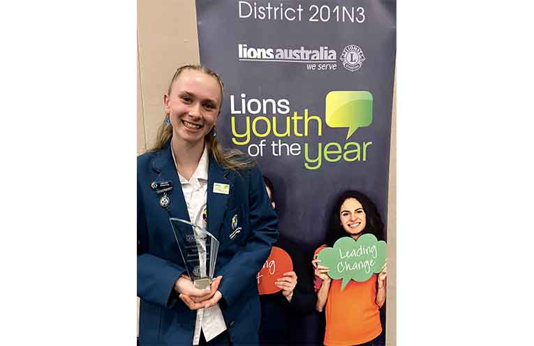 Deena with her Lions Youth of the Year State Finalist trophy. Photo: supplied.