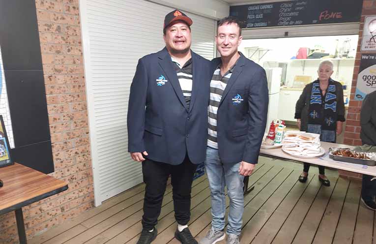 Nelson Bay rugby legends Zion Takarua and Sam Rocher don their 100 senior games jackets after the club’s 56-14 victory over Muswellbrook Heelers at Bill Strong Oval.