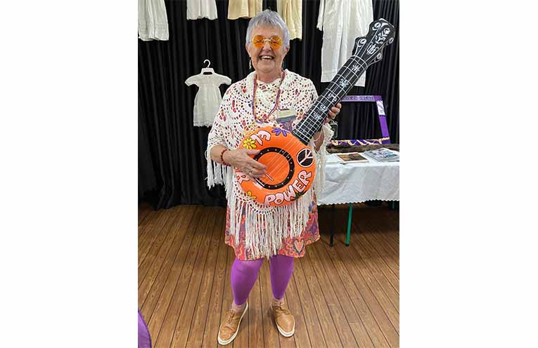 Lucy rocks the Beatles era at the fundraiser.