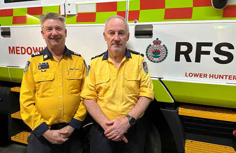 Medowie Rural Fire Brigade Captain Andrew Collins and Deputy Captain and Equipment Officer Ross O’Neill with the brigade’s new Tatra pumper. Photo: Althea Guinsberg.