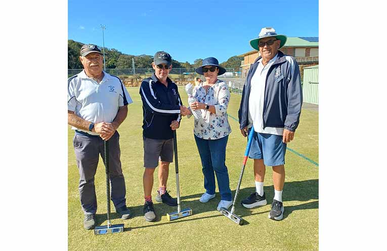Sherry Gordon, Committee Member, presents the trophy to Marty Quirke with Rob Batho (left) and Trevor Black (right).