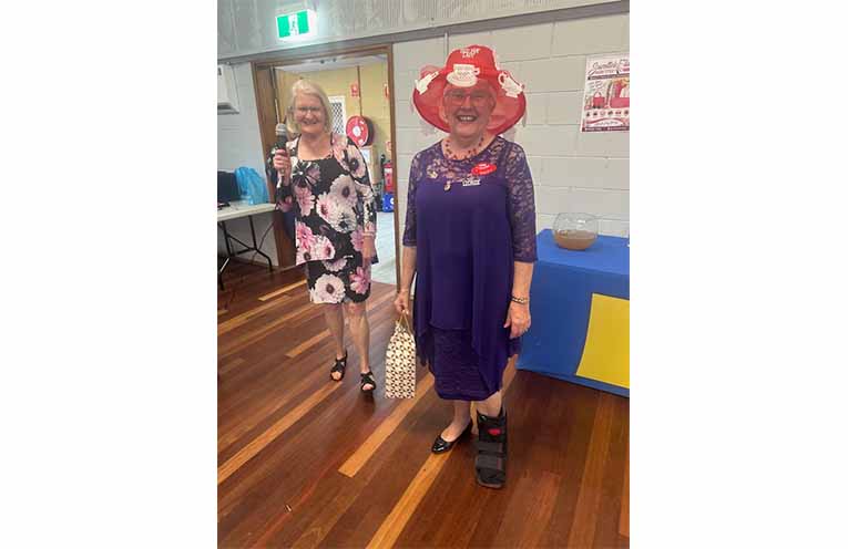 Lions District Governor, Marcia Allman had the difficult task of judging the hat competition. Photo: Althea Guinsberg.