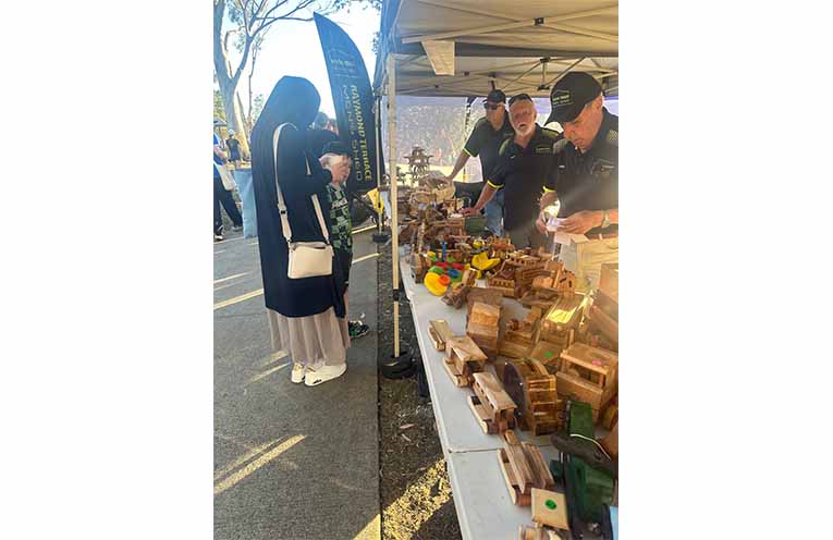 Raymond Terrace Men’s Shed selling their beautiful creations. Photo: Althea Guinsberg.