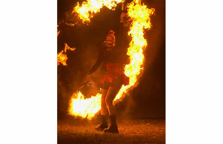 Fire dancers enchanting the crowd with their display. Photo: Althea Guinsberg.