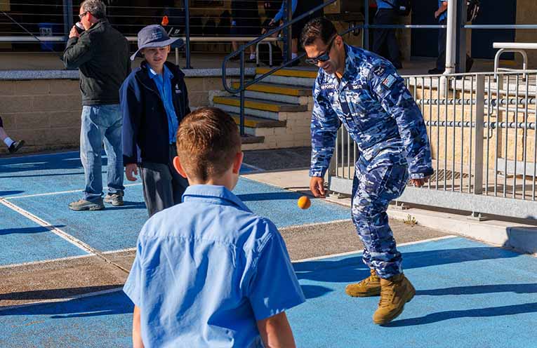 Making memories with Dad at school playing handball. Photo: Supplied.