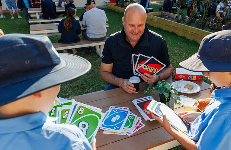 When playing UNO with Dad is more than just a game. Photo: Supplied.