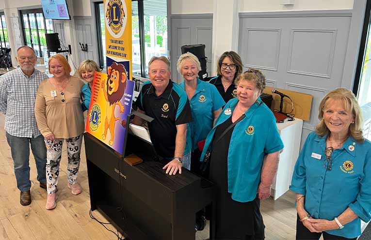 John ‘Stinker’ Clarke with Lions Club members and guests Glynys Francis, Irene Heywood, Brad Rostron, Lee Rostron, Rose Osborne, Jennie Brown and Mary Howard. Photo: Soldiers Point Lions Club.