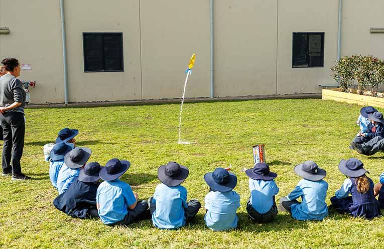 Students launching a rocket ship