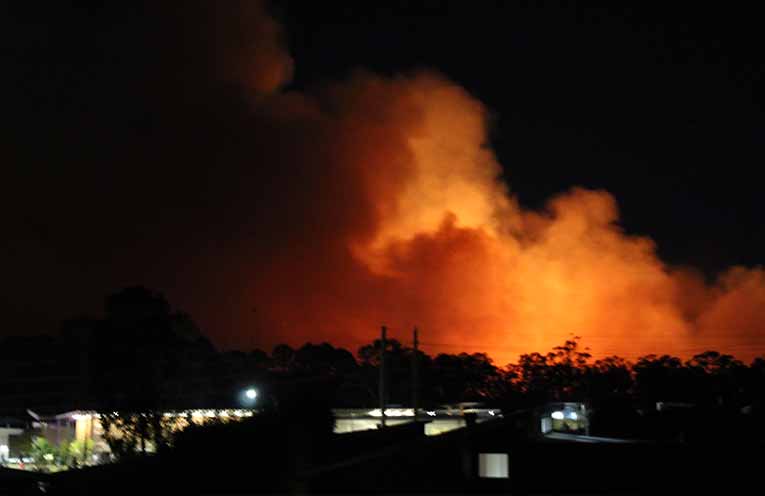 Fire spread to the rear of Catherine McAuley Catholic College. Photo: Ruby van de Wijgaart.