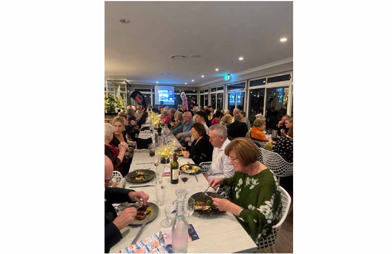 Guests enjoying the fine food and wine at the fundraiser. Photo: Althea Guinsberg.