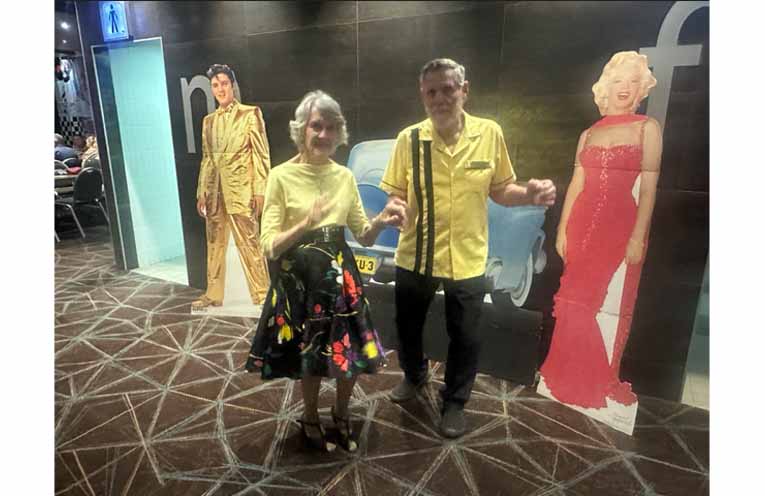 A splash of yellow and plenty of rhythm as this pair gets into the swing of things. Photo: Althea Guinsberg.