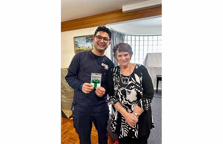 Harbourside staff member Bibash, with Harbourside Retirement Living Resident, Meryl. Photo: Supplied.