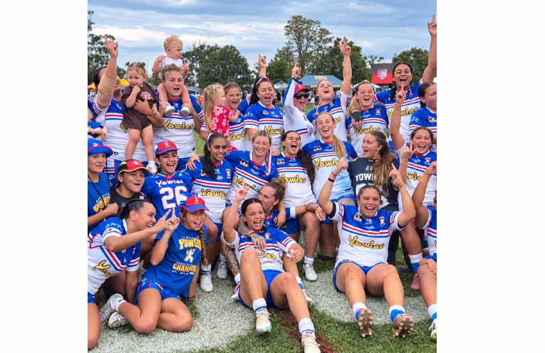 Newcastle Yowies women celebrate with family and supporters at the Koori Knockout. Photo:Althea Guinsberg.