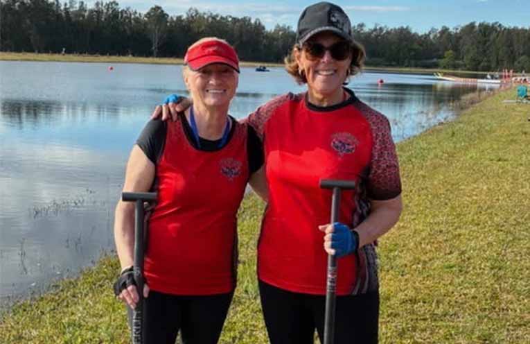 Successful dragon boat racing debuts for Port Stephens paddlers Debbie Berry and Annette Jeffrey.
